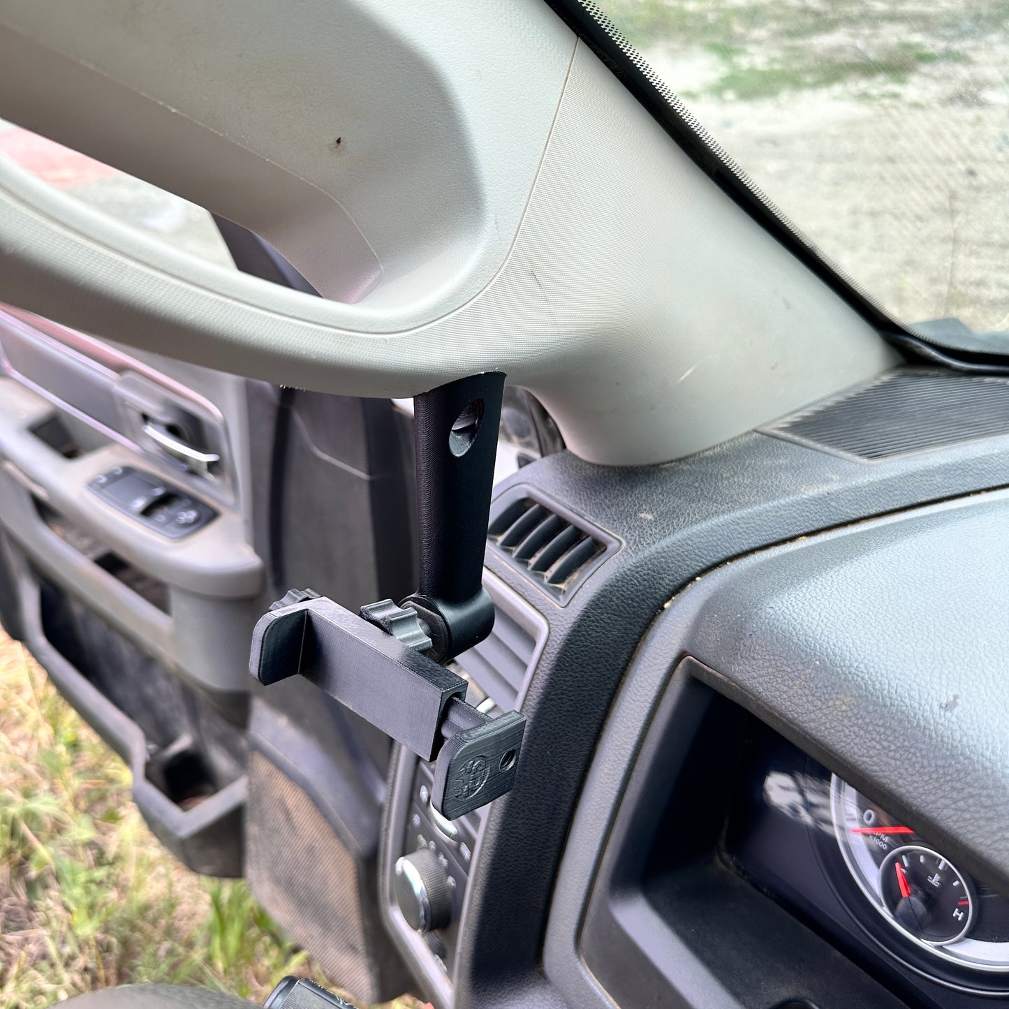 Custom phone mount for 2010-2018 Ram grab handle cap bolt on