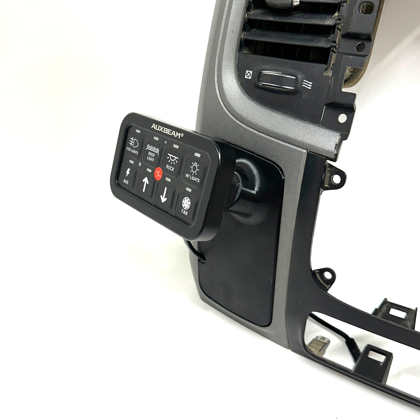 Custom accessory mount for 2013-2018 Ram lower left hand bezel cover cubby trim Auxbeam